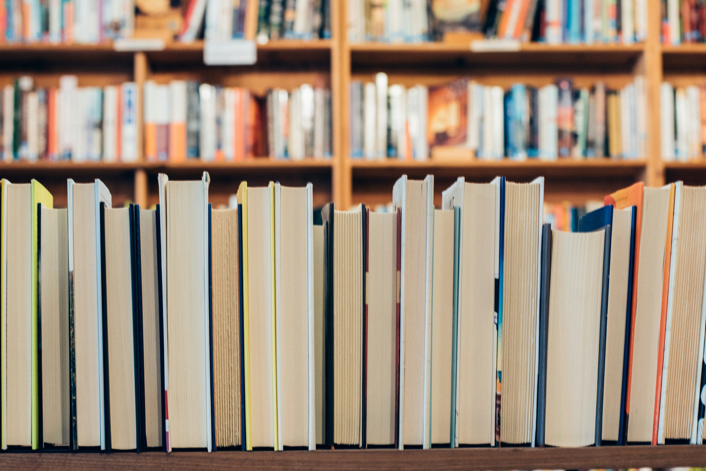 Rows of books on library shelves