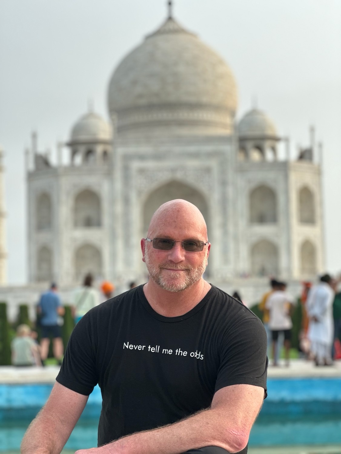 Kermit Farmer seated in front of the Taj Mahal